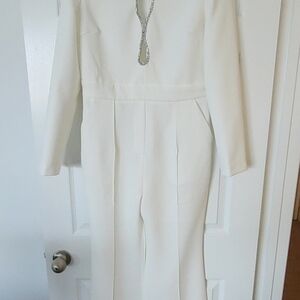 Elegant White Jumpsuit with Chain Detail